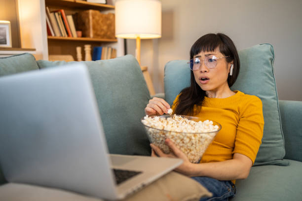istock Woman watching online tv 1990270161