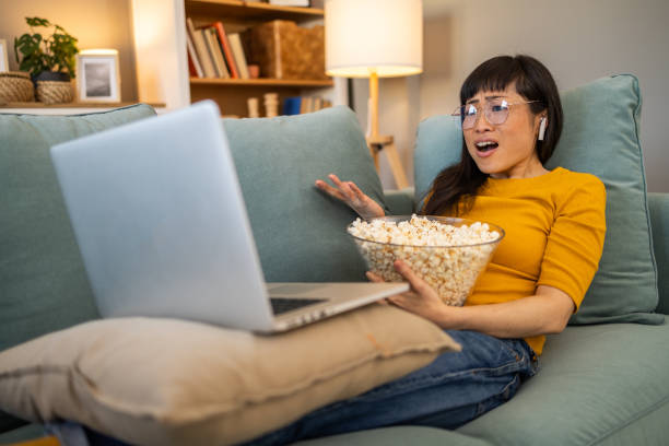 istock Woman watching online tv 1990270575