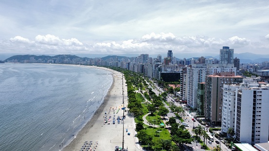 Picture of the beach, the garden and the avenue in Santos, Brazil.