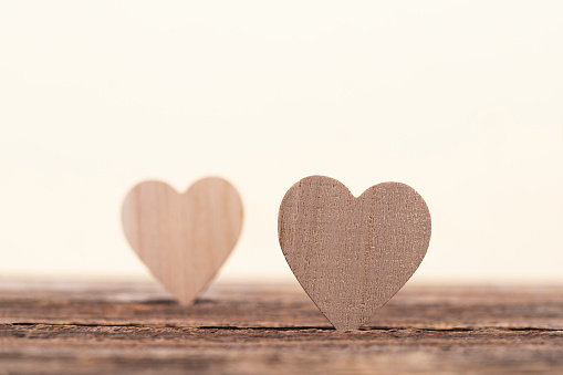 wooden heart form isolated on white background