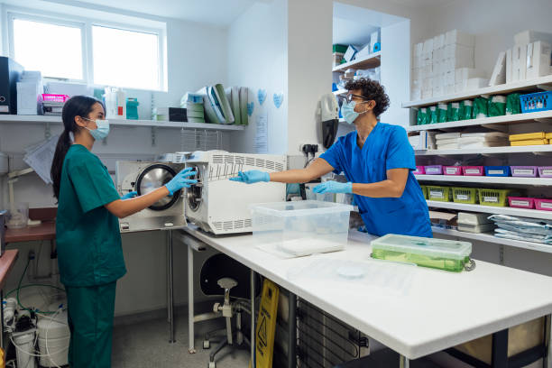 Free Stock Photo of Medical Professional in Scrubs and Mask Operating ...