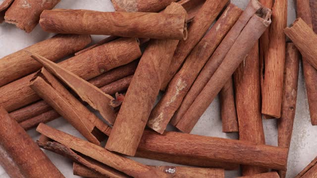 cinnamon sticks in bowl top view dry