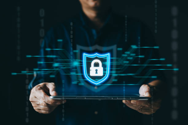 istock Businessmen protect personal data information from viruses on a tablet with virtual screen interfaces. Cyber security and privacy protection network security computer and safe data concept. 1990368552