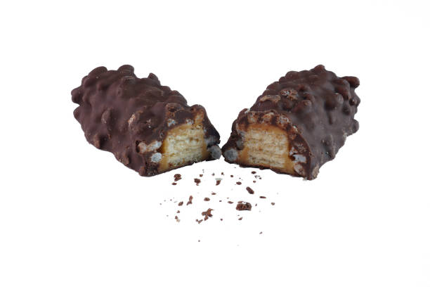istock Chocolate bar stuffed with rice puff, crispy wafer and caramel isolated on white background 1990372814