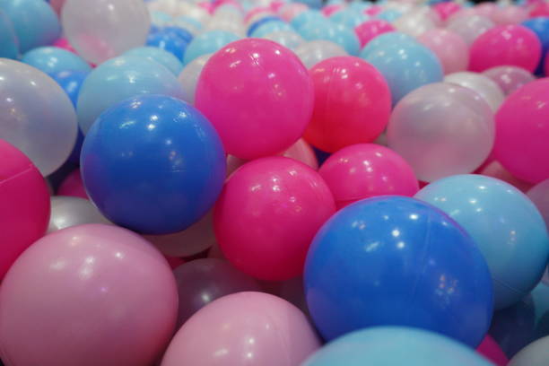 istock Many little colorful balls for ball bath 1990376565