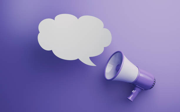 istock Purple & White Megaphone on Speech Bubble Soft Yellow Background 1990379184