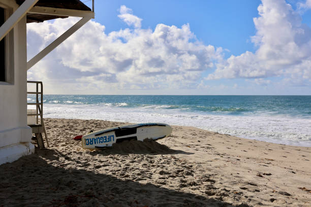 istock Lifeguard tower with rescue surfboard and equipment 1990381338