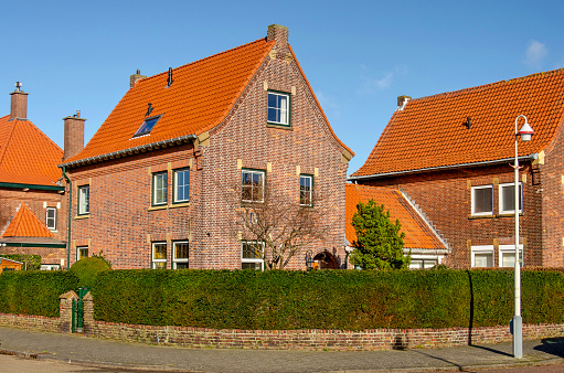 The Hague, The Netherlands, January 26, 2024: house-shaped housing development with traditional brick architecture from the 1930's