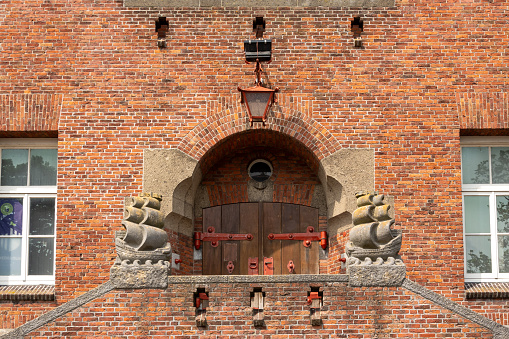 Detail of entrance with doors of former city hall of Medemblik, Noord-Holland, Netherlands
