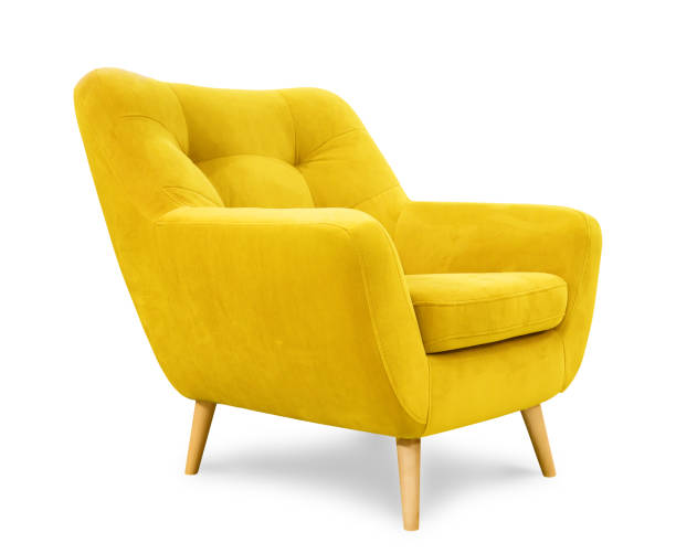 istock Comfortable armchair with wooden feet isolated on white background. 1990386477