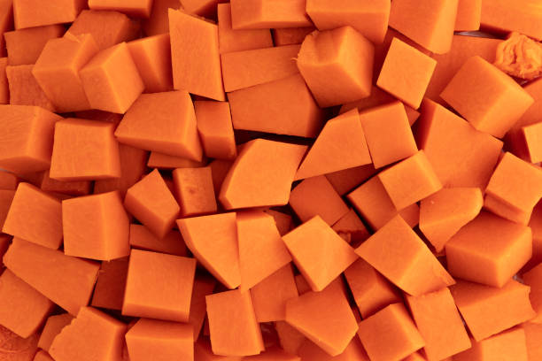 istock background of pumpkin pieces 1990400574