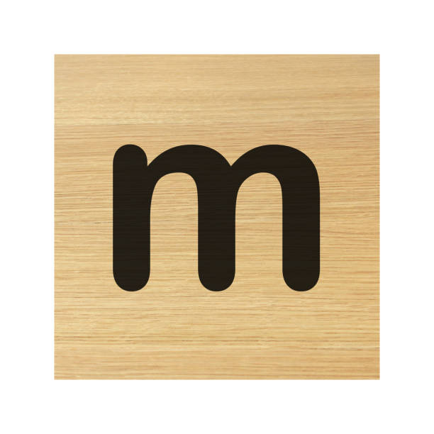 istock small m wood block on white with clipping path 1990405430