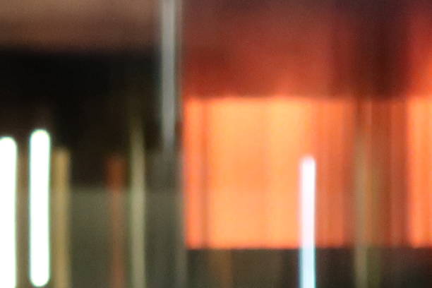 Abstract Background. Brown - Orange -  Black Color Gradient. Defocused. Vertical Pattern Of White Lines.