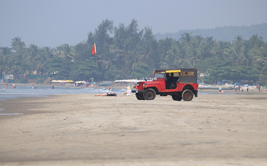 Rescue vehicle on the seashore close to the water. Holidays, tourists, Goa India