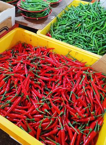 Green and red hot chilli peppers