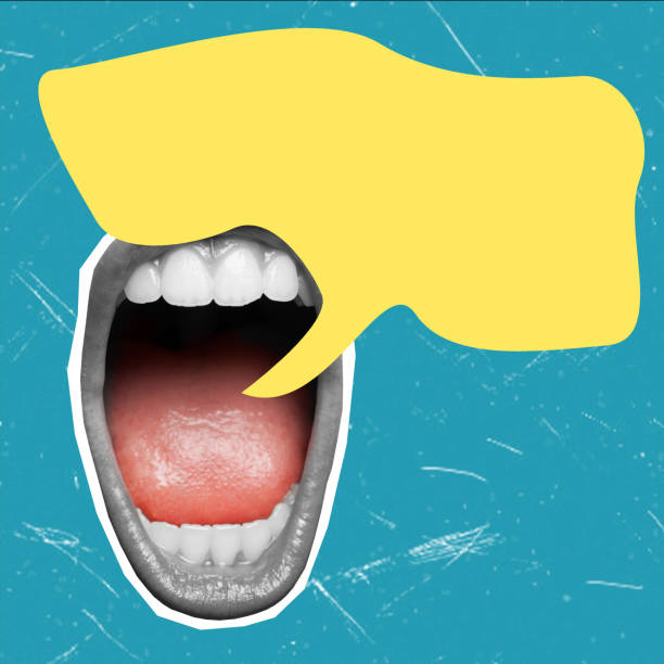 someone shows tongue from the hole in green paper