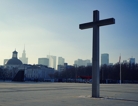 Cross in the center of Warszawa, Poland. View of the city.