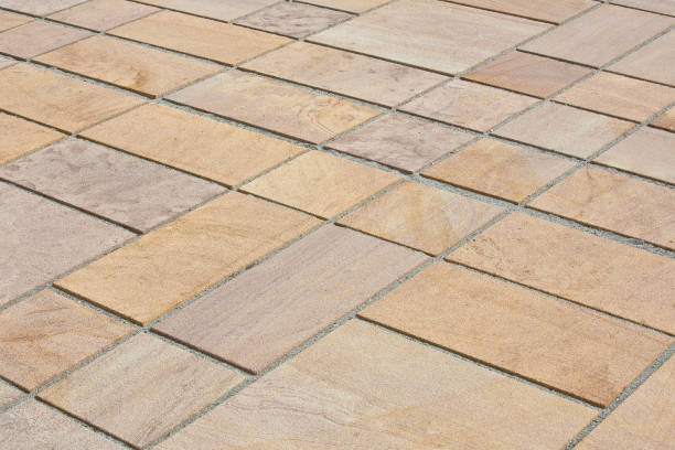 istock New paving made with stone and concrete blocks of rectangular shape in a pedestrian zone 1990524723