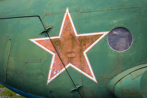 Sovjet red star on military transport helicopter of russian air force