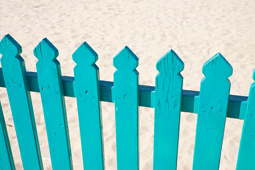 Detail of a green wooden fence