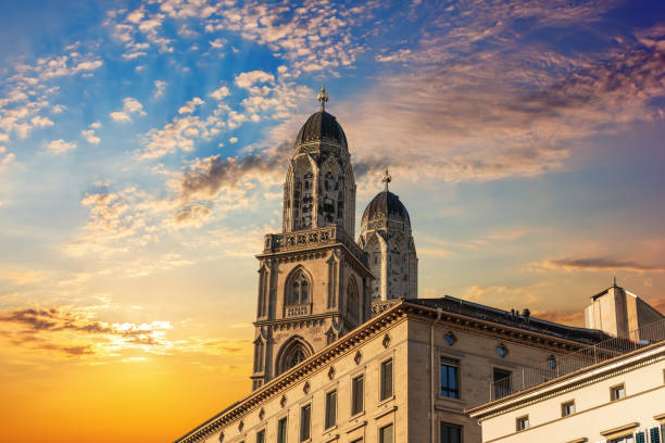 Grossmünster Romanesque-style Protestant church at sunset, Zürich, Switzerland Grossmünster Romanesque-style Protestant church at sunset, Zürich, Switzerland. switzerland zurich architecture church stock pictures, royalty-free photos & images