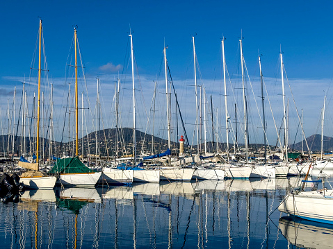 Marina and boats over sunny sky in St Tropez,France