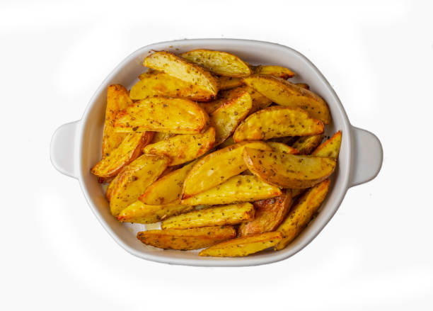 istock Baked spiced potatoes look delicious. 1990629021