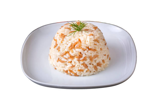 Traditional delicious Turkish food; Turkish style rice pilaf (Turkish name; Arpa sehriyeli pirinc pilavi) Traditional delicious Turkish food; Turkish style rice pilaf (Turkish name; Arpa sehriyeli pirinc pilavi) ARPA stock pictures, royalty-free photos & images