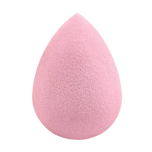 istock Cosmetic product make up egg pink sponge isolated on white background 1990647612