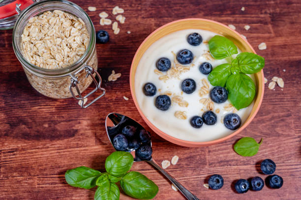 istock Breakfast table with a bowl of yogurt. 1990657022