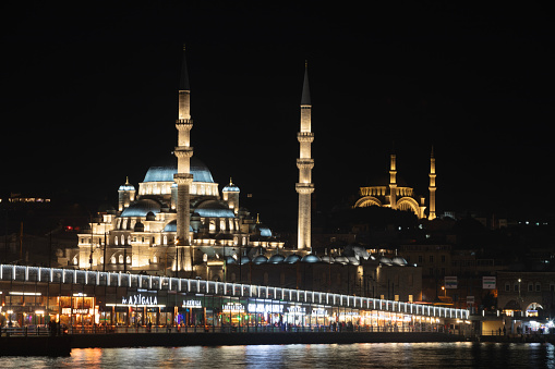 View of Istanbul Golden Horn, Galata Bridge and yeni cami Mosque at night