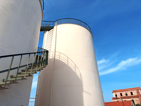 Close up industrial outdoor storage tanks