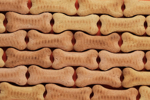 Background of bone shaped cookies flat lay