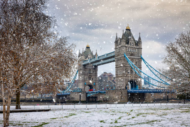 istock Winter view to the snow covered Tower Bridge in London 1990717092