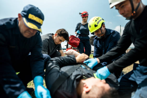 Paramedics placing accident victim on a stretcher