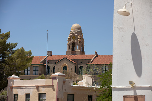 Daytime view of historic homes and historic tower spires of downtown Ajo, Arizona, USA.