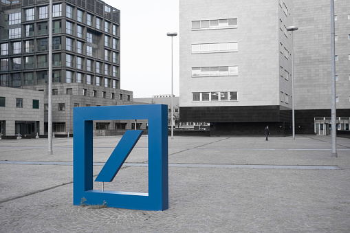 Milan, Italy - 2023, March 29 : The big logo of Deutsche Bank on the square in front of its offices in the Bicocca area of Milan, Italy