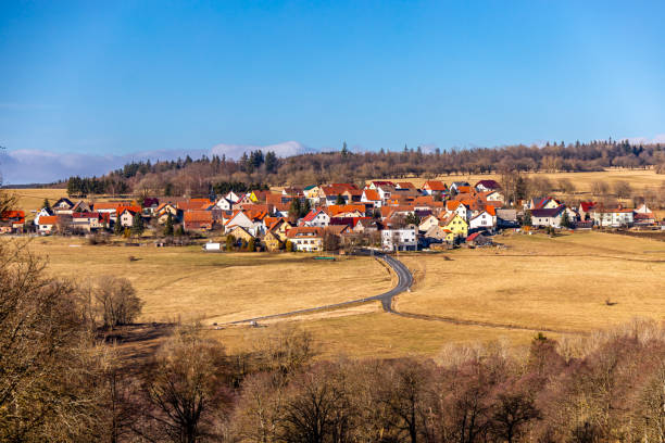 istock Short winter hike on a beautiful sunny day along the former border between Thuringia, Hesse and Bavaria 1990816363