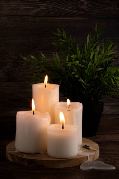 istock photography, candle, wax, candlelight, burning, aromatherapy, spa, flame, decoration, relaxation, tranquil scene, background, table, celebration, glowing, night, light 1990843332