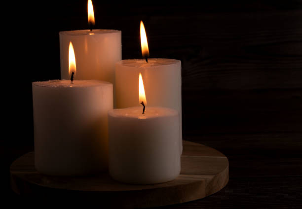 istock photography, candle, candlelight, burning, copy space, flame, wax, relaxation, celebration, horizontal, night, aromatherapy, light, dark, table, no people, religion, bright 1990843335