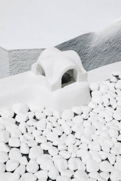istock white stones on a roof in Santorini, Greece 1990846992