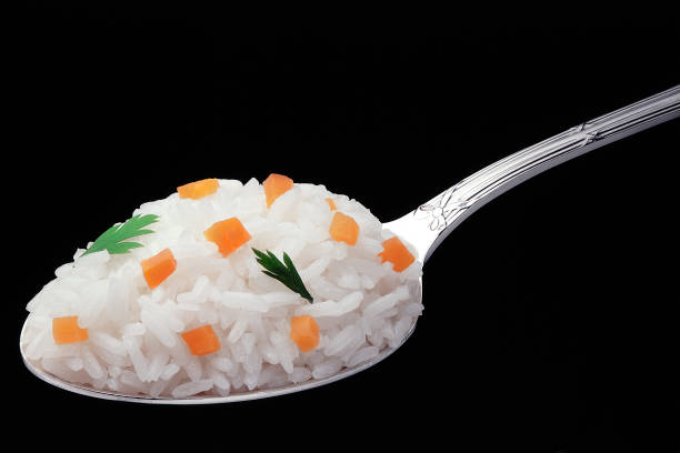 Man eats canned food spoon