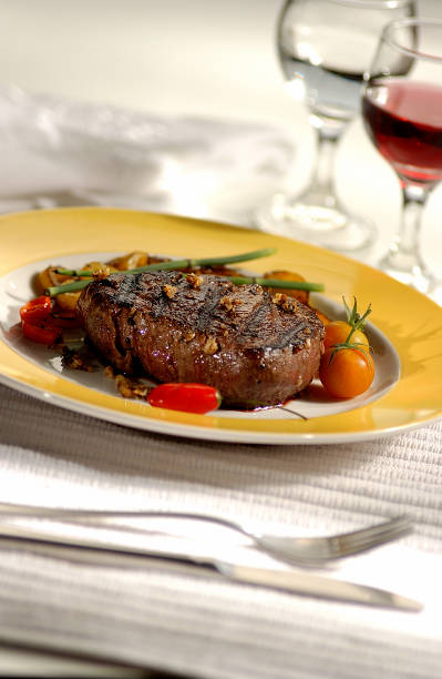 istock Dish of grilled meat, tomatoes and pepper 1990853835