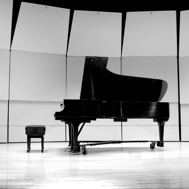istock Black and White Piano on Concert Stage for Performance 1990885298