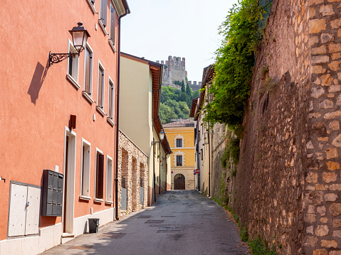 Colourful houses in a street in Soave, Italy