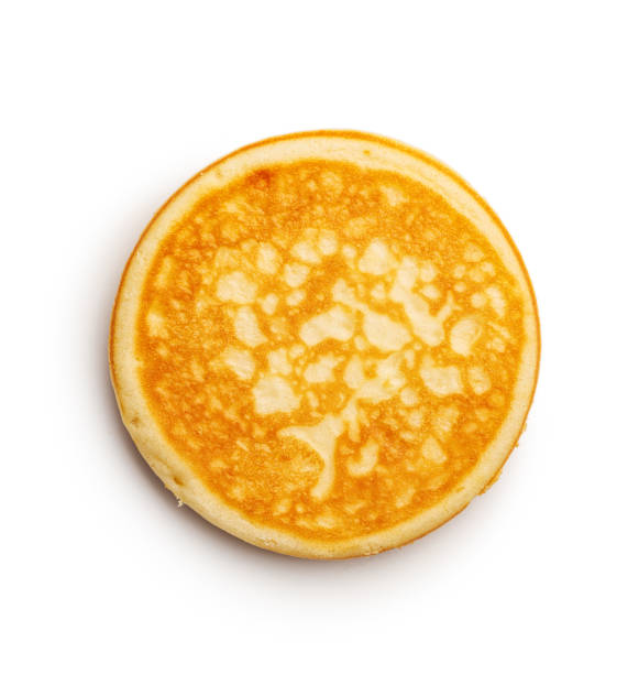 istock Tasty sweet pancakes isolated on white background. 1990906184
