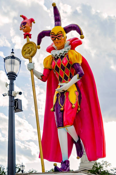 Mobile, Alabama, USA - Feb. 4, 2024: A Mardi Gras jester is commemorated with a statue at Mardi Gras Park, Feb. 4, 2024, in Mobile, Alabama. The park features statues of important figures in the city's Mardi Gras history.