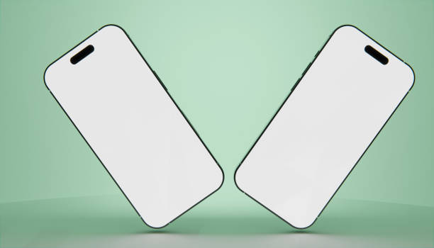 istock full view of two phones with three-dimensional glossy displays on green background 1990946451