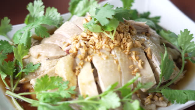 Hainanese Chicken Rice Set Thai food displayed on table.