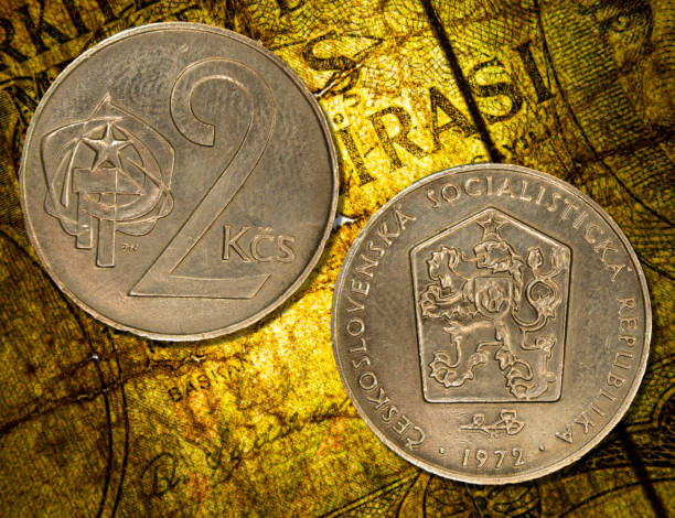 istock Czechoslovakian koruna coins placed on a vintage map 1991054499